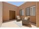 Private patio featuring comfortable seating, and outdoor charm, perfect for relaxing at 4039 E Paradise Dr, Phoenix, AZ 85028