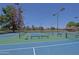 Well-maintained tennis and pickleball courts with vibrant blue and green surfaces, perfect for active living at 4039 E Paradise Dr, Phoenix, AZ 85028