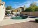 Beautiful backyard pool with sunny lounge area, great for relaxation and recreation at 4102 E Rancho Tierra Dr, Cave Creek, AZ 85331