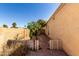 Backyard showcases a charming rock area with a small tree and an enclosed area at 4102 W Bluefield Ave, Glendale, AZ 85308