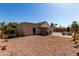 The property showcases a spacious backyard with mature trees, dining, and a firepit at 4102 W Bluefield Ave, Glendale, AZ 85308