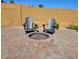 Paver stone patio with fire pit and relaxing Adirondack chairs, perfect for outdoor enjoyment at 4102 W Bluefield Ave, Glendale, AZ 85308