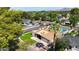 An elevated view shows a neighborhood street with well maintained homes and manicured landscaping at 4202 E Catalina Dr, Phoenix, AZ 85018