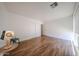 Spacious bedroom featuring wood flooring, lots of natural light, and a large closet at 4202 E Catalina Dr, Phoenix, AZ 85018