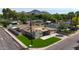 Contemporary home featuring an expansive lawn, modern architecture, and mountain views at 4202 E Catalina Dr, Phoenix, AZ 85018