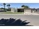 Charming single-story home boasting a modern facade, manicured lawn, and an attached garage with a unique door design at 4202 E Catalina Dr, Phoenix, AZ 85018
