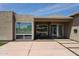 Modern home featuring a walkway with grass accents, a large front window, and desert landscaping at 4202 E Catalina Dr, Phoenix, AZ 85018
