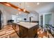 Spacious open kitchen featuring a large island with modern appliances and a unique flooring pattern at 4202 E Catalina Dr, Phoenix, AZ 85018