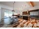 Spacious kitchen and dining area with a large island, pendant lighting, and modern design at 4202 E Catalina Dr, Phoenix, AZ 85018