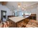 Modern kitchen with a large island, sleek countertops, and stainless steel appliances perfect for cooking and entertaining at 4202 E Catalina Dr, Phoenix, AZ 85018