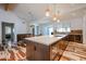 Spacious kitchen and dining area with a large island, pendant lighting, and modern design at 4202 E Catalina Dr, Phoenix, AZ 85018