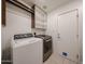 Functional laundry room with modern washer and dryer at 4202 E Catalina Dr, Phoenix, AZ 85018