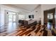 Bright living room with modern design, hardwood floors, and large windows, perfect for relaxation and entertainment at 4202 E Catalina Dr, Phoenix, AZ 85018