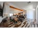 Bright, open living area connecting to the kitchen, with stylish decor and plenty of natural light, perfect for entertaining at 4202 E Catalina Dr, Phoenix, AZ 85018