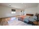 Large main bedroom featuring hardwood floors, a calm and spacious layout, and plenty of natural light at 4202 E Catalina Dr, Phoenix, AZ 85018