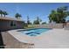 Swimming pool with in-ground hot tub surrounded by concrete and gravel and an artificial turf lawn at 4202 E Catalina Dr, Phoenix, AZ 85018