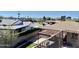 A view from the balcony overlooking the neighborhood, showcasing rooftops and mature trees at 4213 N Westview Dr, Phoenix, AZ 85015