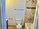 Bright bathroom features tile accents, a shower-tub combination, and neutral finishes at 4213 N Westview Dr, Phoenix, AZ 85015