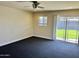 Bedroom with sliding glass doors provides outdoor access and floods room with light at 4213 N Westview Dr, Phoenix, AZ 85015