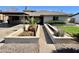 Charming single-story home with desert landscaping in the front yard at 4213 N Westview Dr, Phoenix, AZ 85015