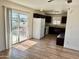 Bright kitchen featuring classic cabinets, white appliances, and a sliding door to the balcony at 4213 N Westview Dr, Phoenix, AZ 85015