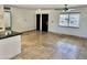 Spacious open-concept living room with tiled floors and natural light at 4213 N Westview Dr, Phoenix, AZ 85015