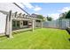 Charming backyard with a covered patio swing, perfect for relaxation at 4455 E Marshall Ave, Gilbert, AZ 85297