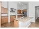Bright kitchen with stainless steel appliances, a center island, and wood cabinets at 4455 E Marshall Ave, Gilbert, AZ 85297