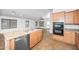 Kitchen featuring stainless steel dishwasher and neutral cabinets at 4455 E Marshall Ave, Gilbert, AZ 85297