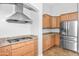 Modern kitchen with stainless steel appliances and neutral cabinets at 4455 E Marshall Ave, Gilbert, AZ 85297