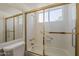 Bathroom offers tub/shower and updated grab bars for safety and accessibility at 4627 E Mcneil St, Phoenix, AZ 85044