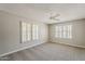 This bedroom offers ample space and features multiple windows for natural light at 4627 E Mcneil St, Phoenix, AZ 85044