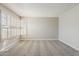This bedroom has neutral colors, carpeted floors, and shutters on the windows at 4627 E Mcneil St, Phoenix, AZ 85044