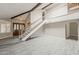 Spacious foyer with laminate flooring, staircase and a double-door entry at 4627 E Mcneil St, Phoenix, AZ 85044
