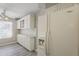 Bright kitchen with white cabinets, appliances, and refrigerator with water and ice dispenser at 4627 E Mcneil St, Phoenix, AZ 85044