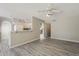 Open living space featuring a view of the staircase and the white kitchen at 4627 E Mcneil St, Phoenix, AZ 85044