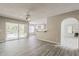 Open living space with sliding glass doors to the pool area and views of the yard at 4627 E Mcneil St, Phoenix, AZ 85044
