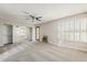 Spacious bedroom with fireplace, mirrored closet doors, shutters and ceiling fan at 4627 E Mcneil St, Phoenix, AZ 85044