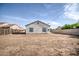 Expansive backyard featuring a sturdy block wall for added privacy and security at 5230 E Pony Track Ln, San Tan Valley, AZ 85140