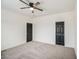 Bedroom with neutral walls, carpeted floor, and ceiling fan at 5230 E Pony Track Ln, San Tan Valley, AZ 85140