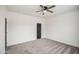Spacious bedroom featuring neutral decor and a ceiling fan for optimal comfort at 5230 E Pony Track Ln, San Tan Valley, AZ 85140