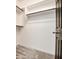 Walk-in closet featuring neutral paint, carpet, and metal rack at 5230 E Pony Track Ln, San Tan Valley, AZ 85140