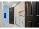 Conveniently located laundry room with new appliances and a practical layout at 5230 E Pony Track Ln, San Tan Valley, AZ 85140