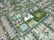 The aerial view presents a community pool, park, tennis courts, and roundabout within a neighborhood at 5515 S Caisson Way, Mesa, AZ 85212