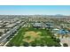 A view of the neighborhood including a playground, sports field, and community buildings at 5515 S Caisson Way, Mesa, AZ 85212