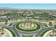 Birds eye view of a palm tree lined roundabout in a quiet neighborhood at 5515 S Caisson Way, Mesa, AZ 85212