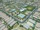 Community aerial view showcasing tennis courts, lush landscape, and a relaxing community pool area at 5515 S Caisson Way, Mesa, AZ 85212