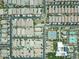 The aerial view features neighborhood homes, pools, a tennis court, and a large community pool and park at 5515 S Caisson Way, Mesa, AZ 85212