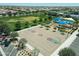 Overhead shot of a community basketball court with a shade covered picnic area in the background at 5515 S Caisson Way, Mesa, AZ 85212