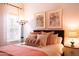 Bright bedroom with natural light, plush bedding, and tasteful decor, creating an inviting space at 5515 S Caisson Way, Mesa, AZ 85212